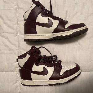 Nike women’s high top burgundy dunks